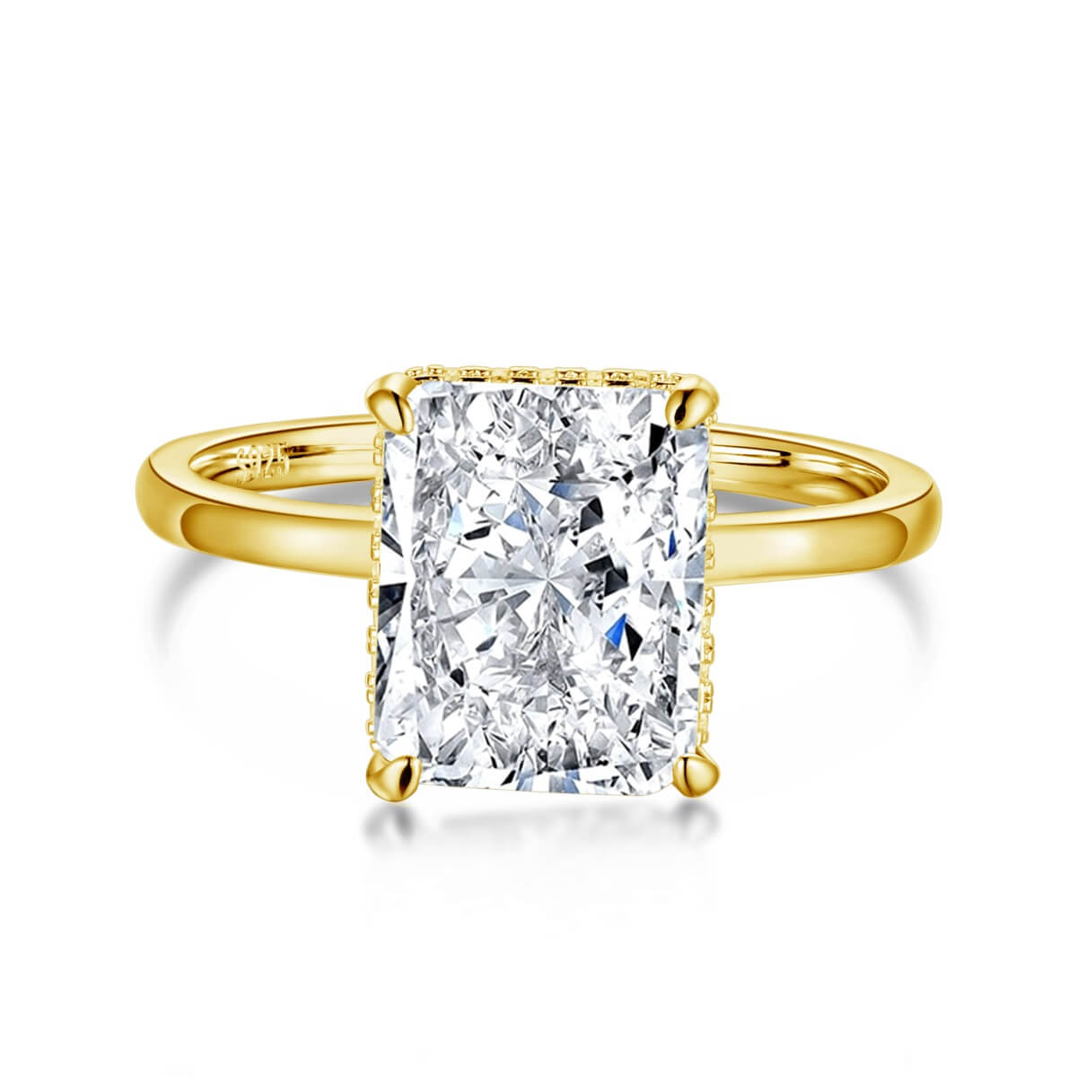 A radiant cut diamond ring with a silver band and a yellow gold setting.
